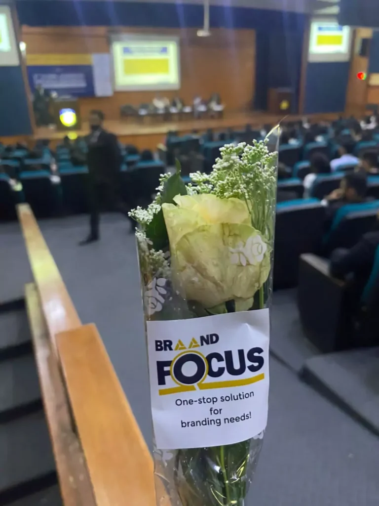 Flowers arranged in a vase, ready for the event.